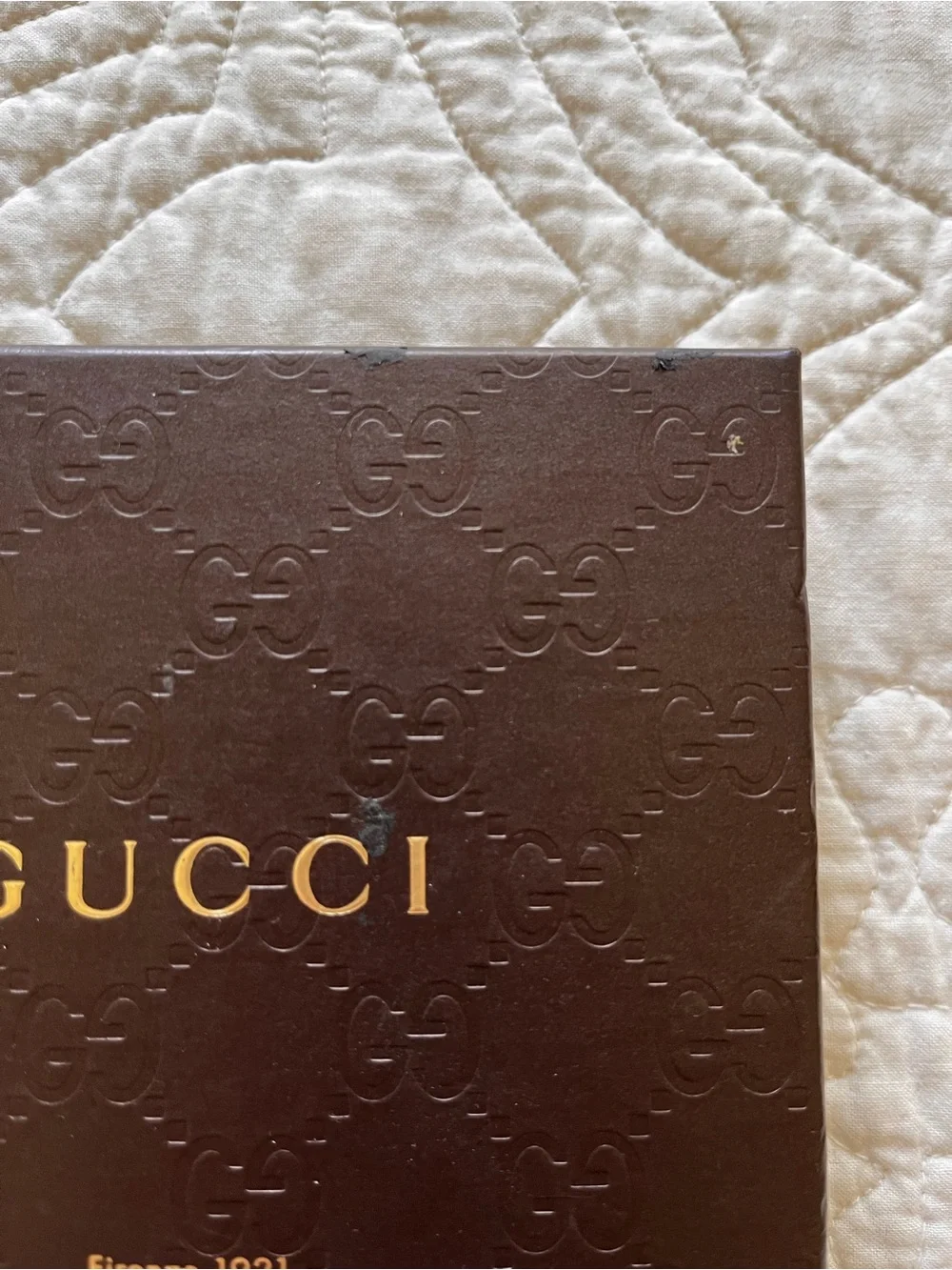 Gucci embossed pattern